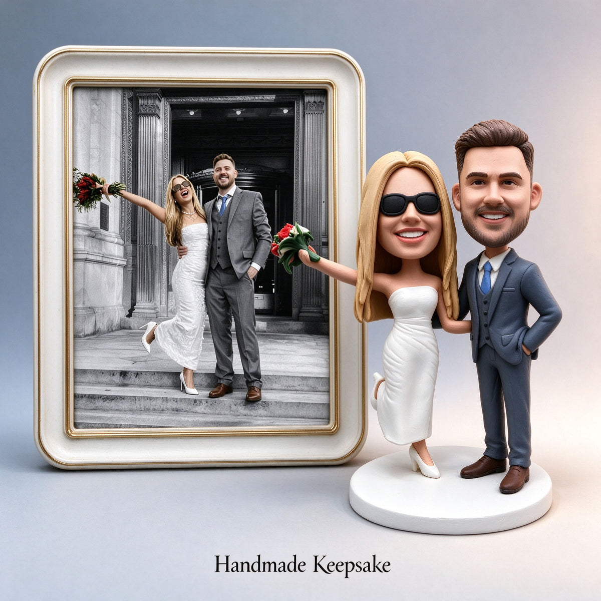 Custom wedding couple keepsake figurine displayed next to a framed photo of the real couple - handmade to order from your photo