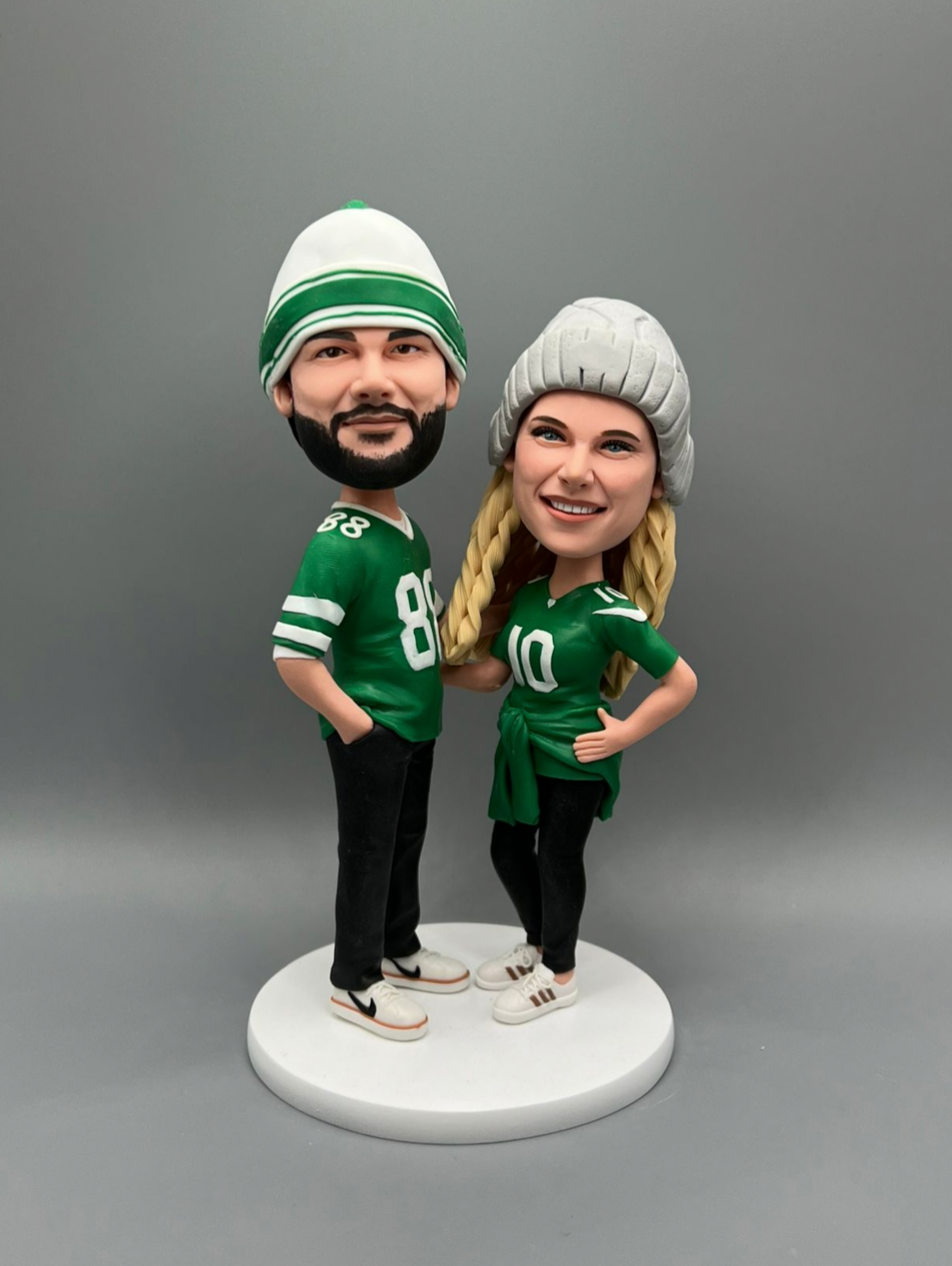 Front view of a custom handmade polymer clay figurine showing two best friends as a keepsake sculpture by LustarStudio