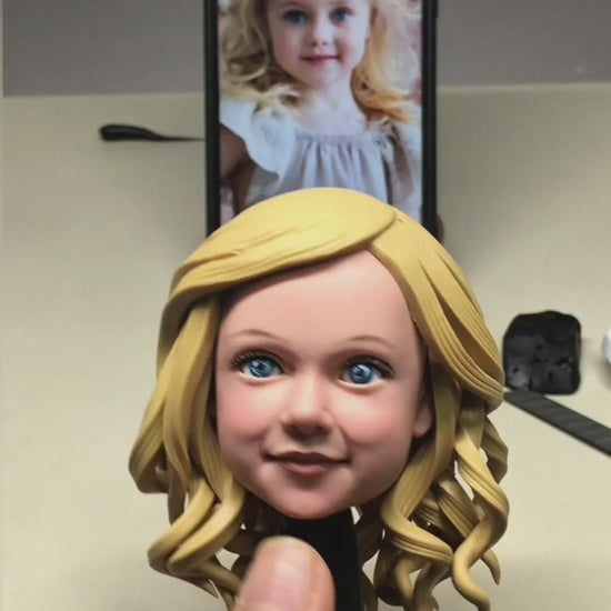 Hand-painting a custom polymer clay figurine made from a customer's photo
