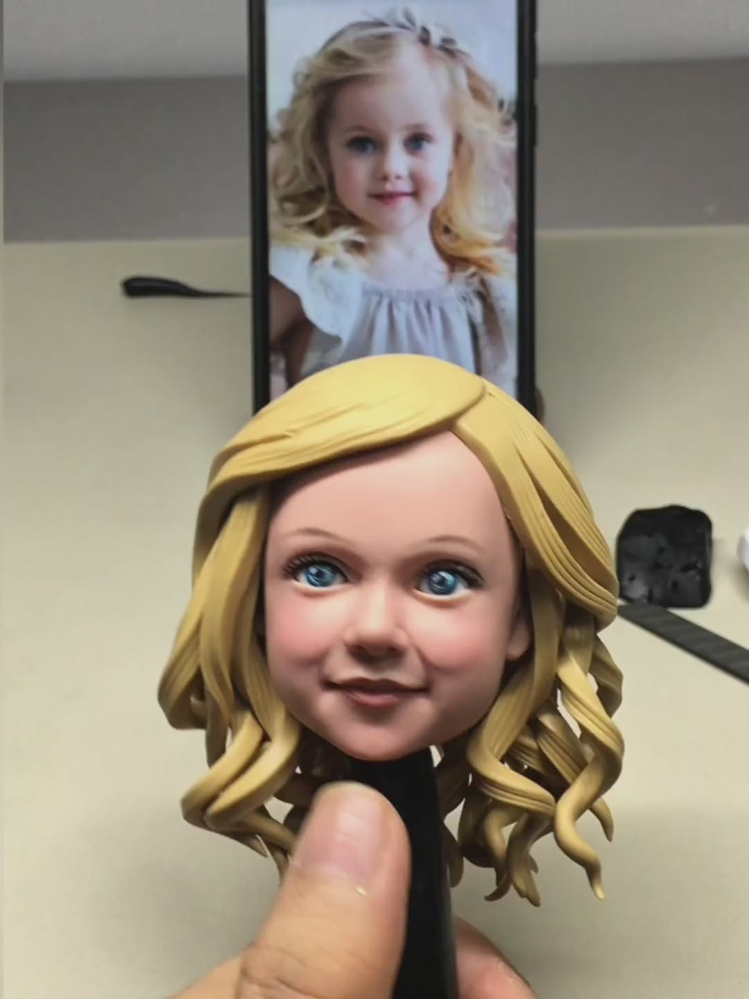 Hand-painting a custom polymer clay figurine made from a customer's photo